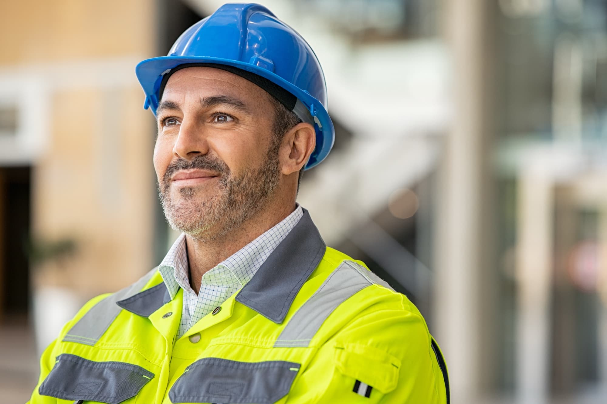 Contractor standing on a construction site