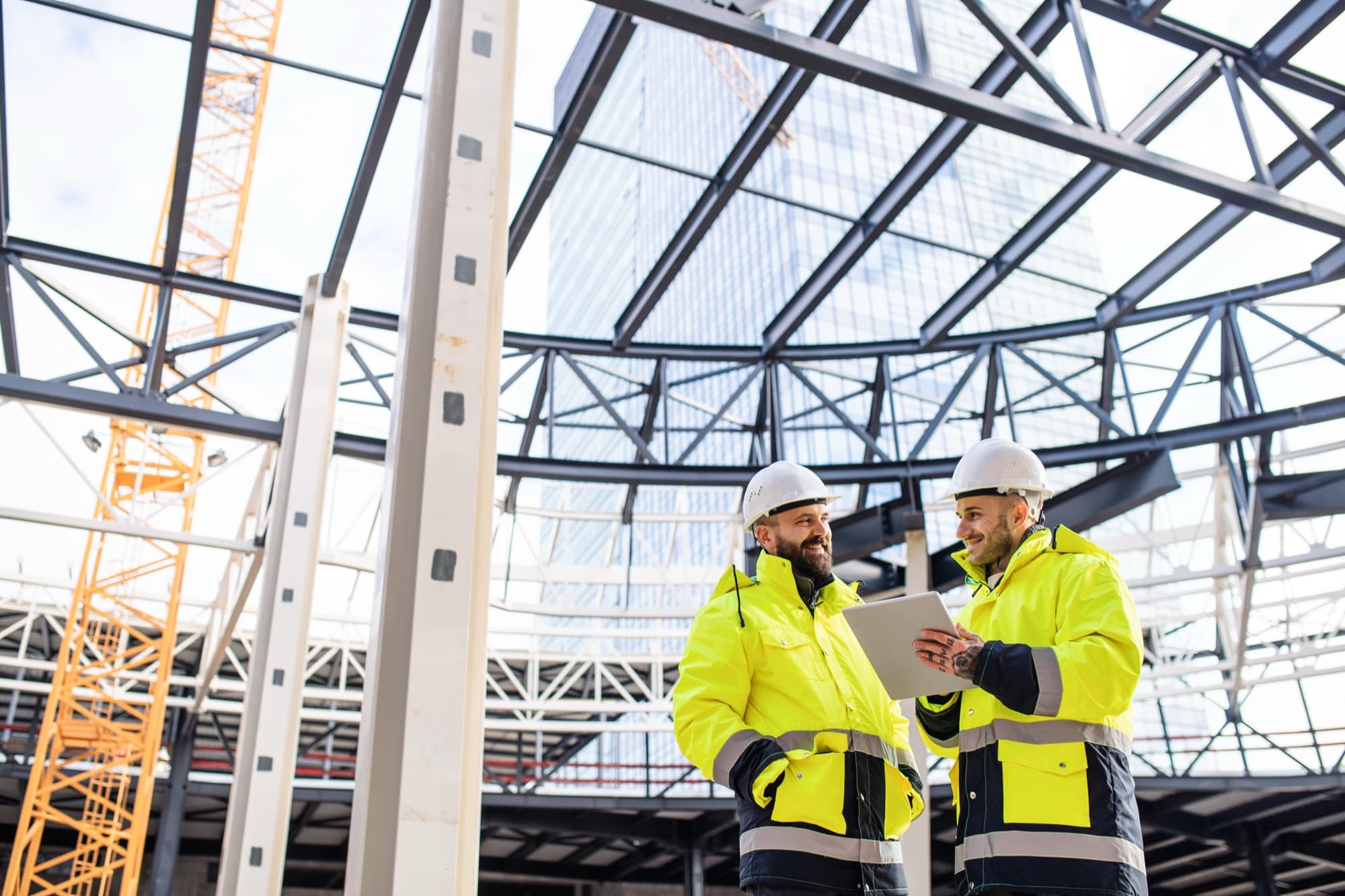 Specialist engineers working on a steel structure